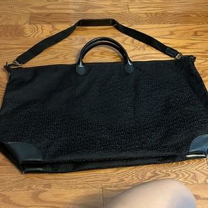 Longchamp traveling bag
